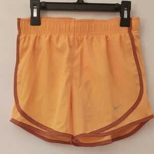 Nike Girl's Orange Athletic Shorts with Rust Trim